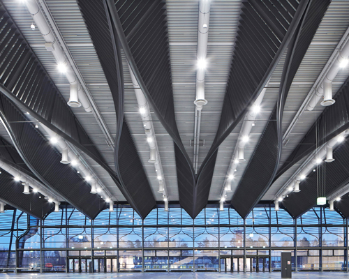 zaha hadid architects to expand nuremberg exhibition site with new hall