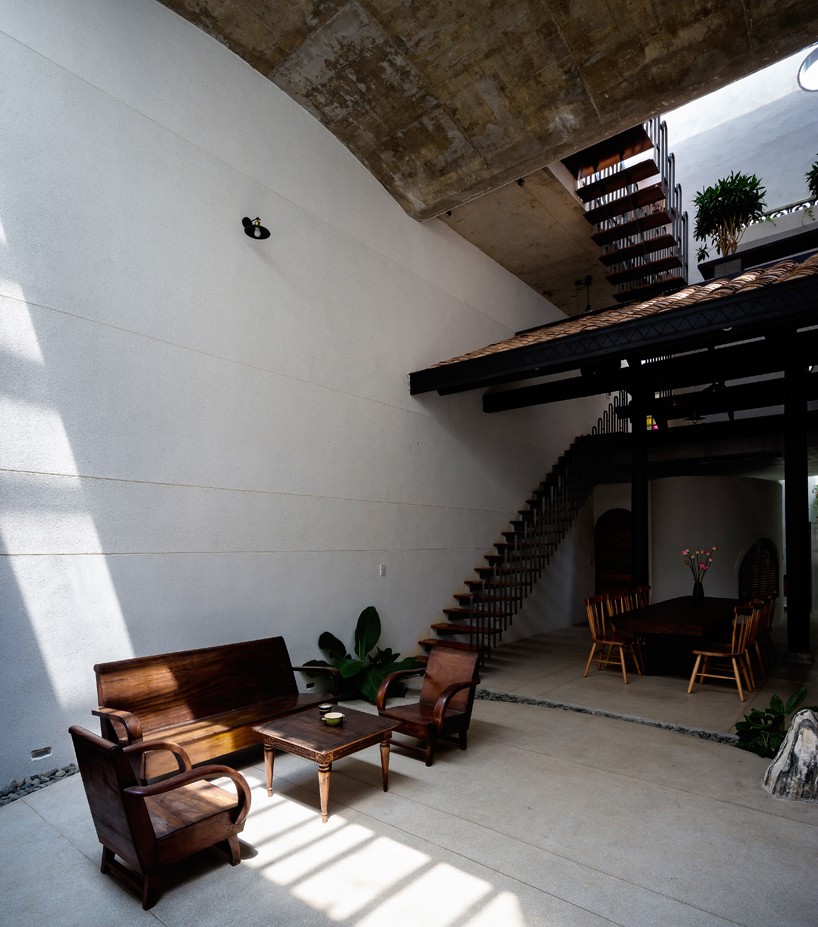 the memory house by 23o5 studio in vietnam hosts three generations ...