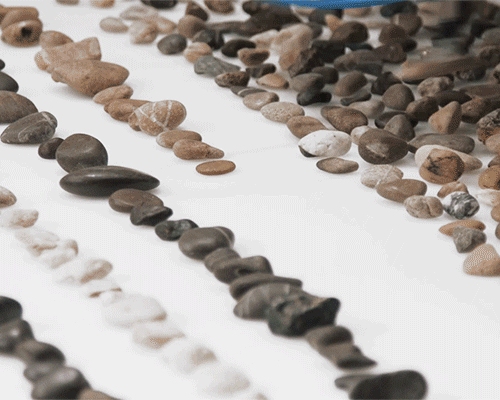 robotic rock installation sorts stones based on their geological age