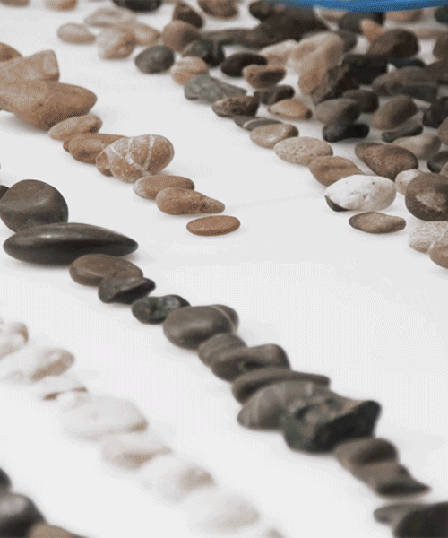 robotic rock installation sorts stones based on their geological age