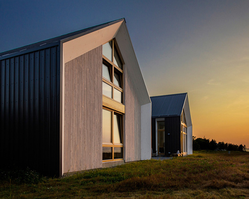 YH2 unites two gable volumes to form single holiday home in canada