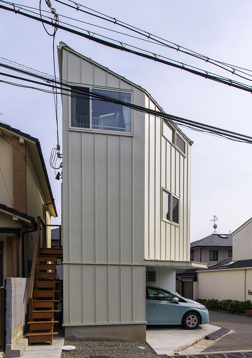 angular residence by coo planning sits on a corner plot