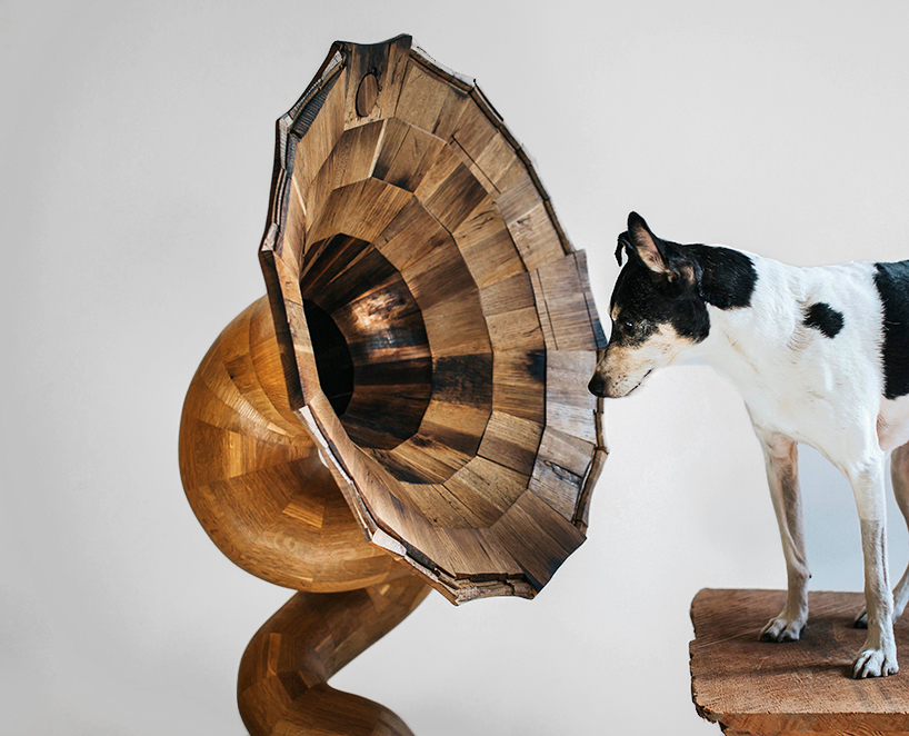 fiddle & hammer carves giant wooden horn speakers from reclaimed liquor barrels