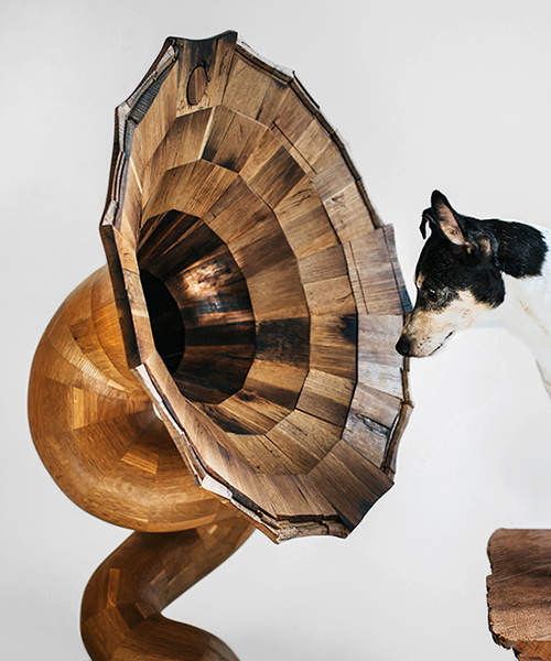 fiddle & hammer carves giant wooden horn speakers from reclaimed liquor barrels