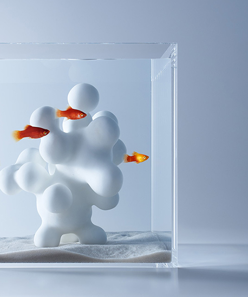 haruka misawa explores relationship of objects in aquariums with whimsical waterscapes