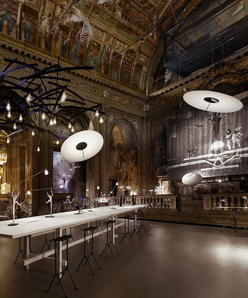 ingo maurer sets lighting exhibition within former church in milan