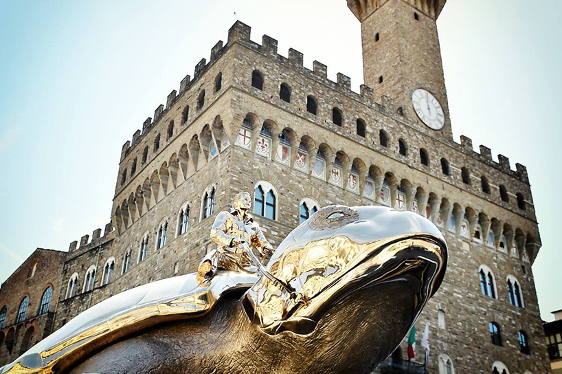 jan fabre unfolds spiritual guards across a piazza, palazzo and fort in florence