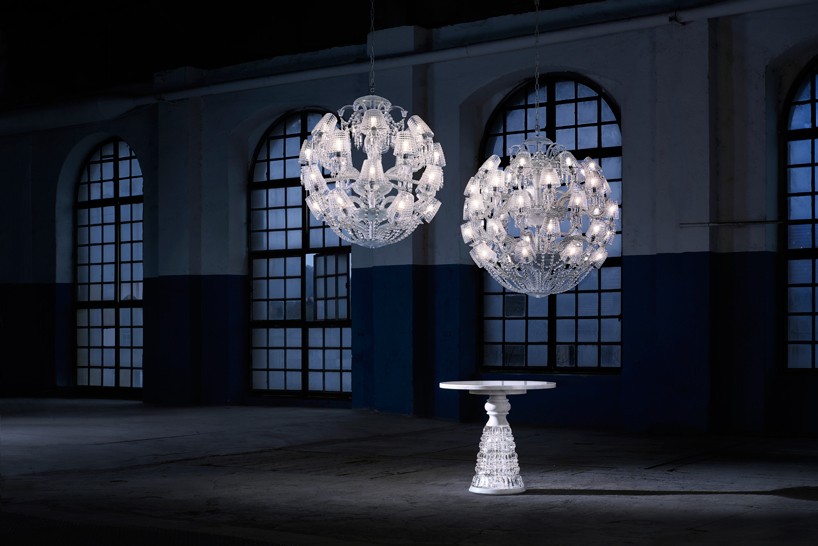 le roi soleil by marcel wanders for baccarat is adjourned with crystal shades and cut motifs