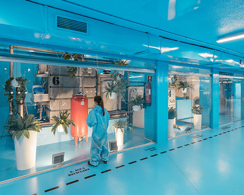 lina toro transforms madrid car wash with vibrant blue surfaces and glass display cases
