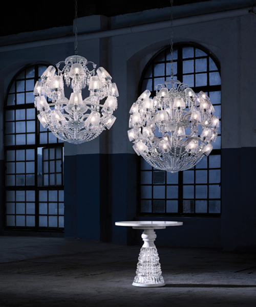 le roi soleil by marcel wanders for baccarat is adjourned with crystal shades and cut motifs