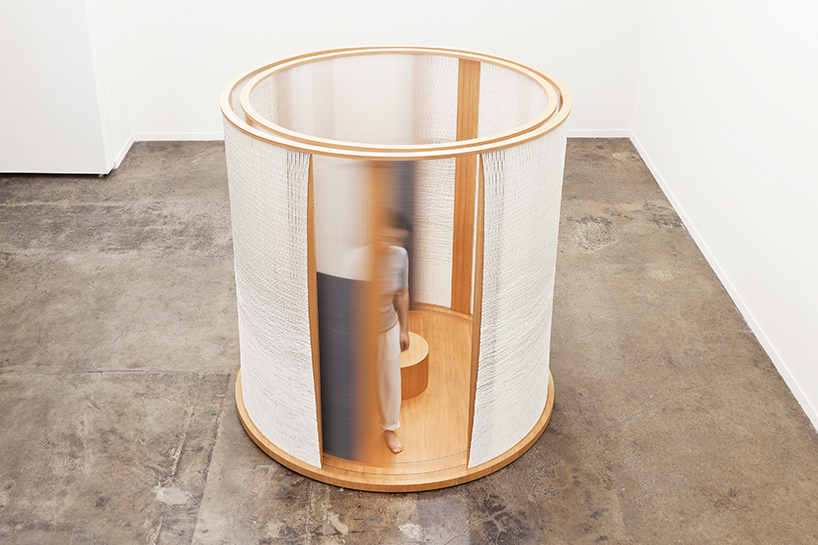 mimi jung's modern-day tea house envelops entrants within woven revolving walls