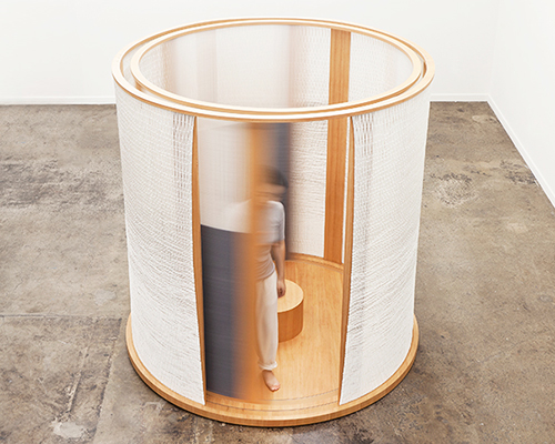 mimi jung's modern-day tea house envelops entrants within woven revolving walls