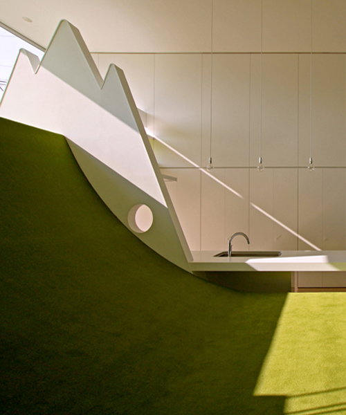mitsuharu kojima architects adds curved floor to japanese house