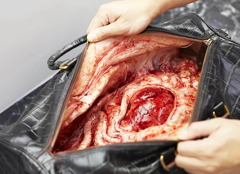 PETA shocks shoppers with beating hearts in 'luxury leather' accessories