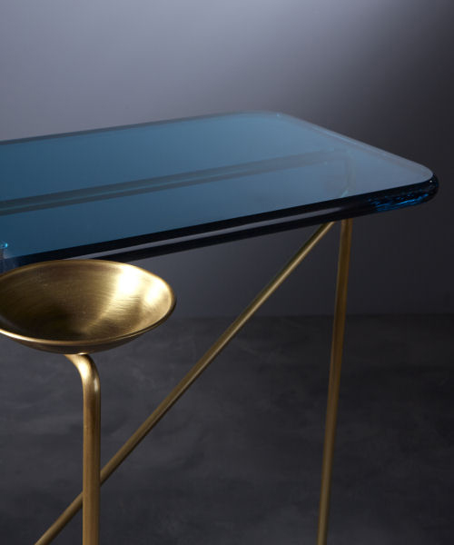 roberto giacomucci combines brass and methacrylate surfaces in empirica collection