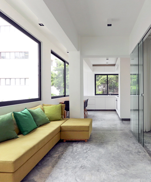 rocker lange architects links apartment renovation to hong kong's landscape