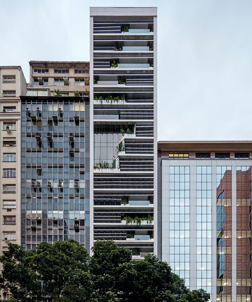 triptyque introduces sustainable techniques to zig-zagged office tower in rio