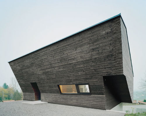 yonder sets oblique-shaped mountain retreat in rural germany