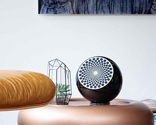 zemi aria features ron arad's spherical themes paired with premium audio components