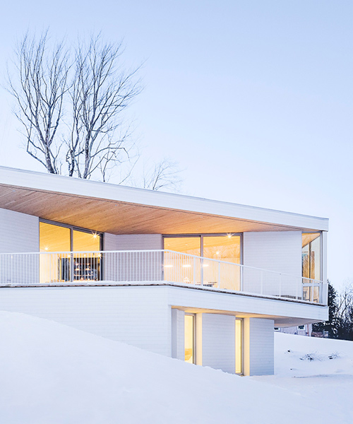 nook residence by MU architecture responds to quebec's undulating terrain