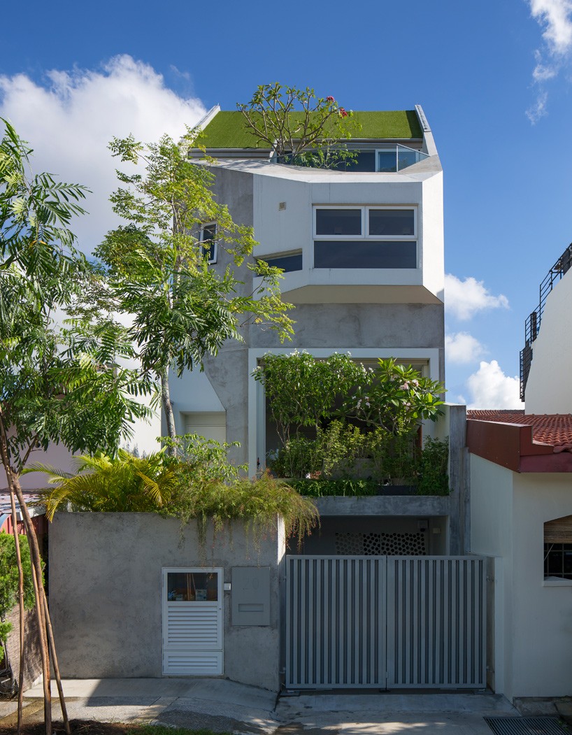 A D lab fills multi-tiered residence in singapore with trees and plants