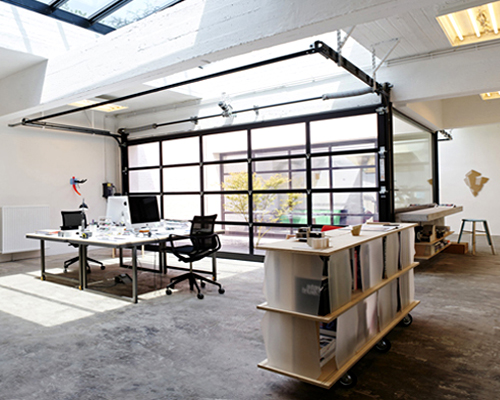ajstudio transforms a laundromat into their working space in brussels