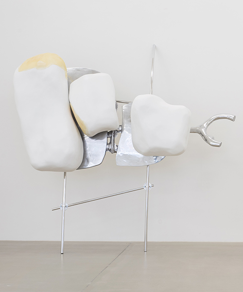 nairy baghramian's giant teeth sculptures turn london gallery into a set of jaws