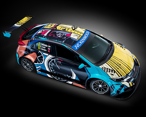 jean graton's 1957 racing comic set in motion on honda's civic world touring car