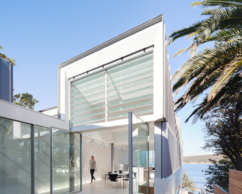 marston architects adapts narrow site into light-filled beach home in australia