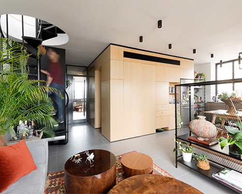 the k.o.t project inserts functional box into duplex apartment in tel aviv