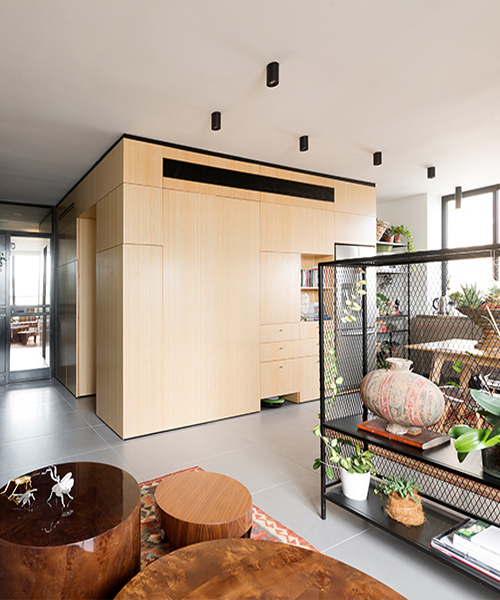 the k.o.t project inserts functional box into duplex apartment in tel aviv