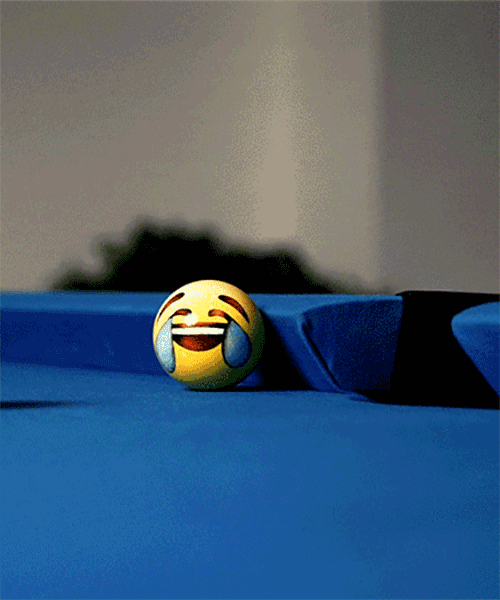 emoji-painted billiard balls take on playful personalities in the 'poolmoji' set