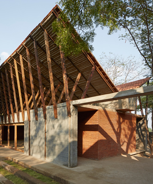 sP+a tops holistic community centre in rural india with butterfly roof
