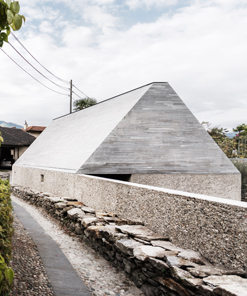 studio inches crafts monolithic mecri museum extension in switzerland