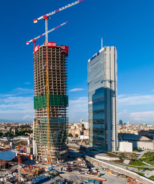 zaha hadid's twisting generali tower tops out at 44-floors in milan