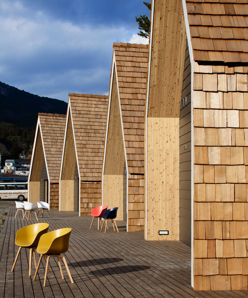 zai shirakawa organizes shingle-clad N village by the coast in japan