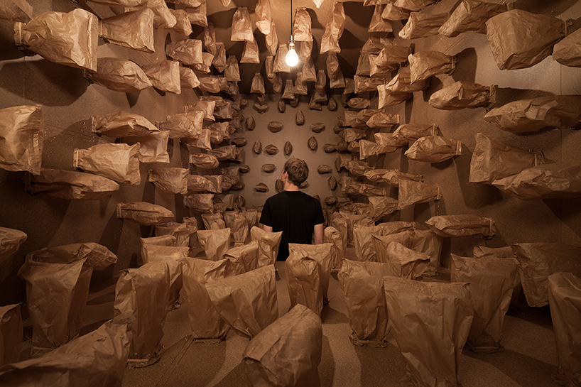 zimoun-art-basel-317-prepared-dc-motors-paper-bags-shipping-container-designboom-01