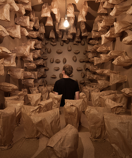 zimoun installs a soundscape of motorized paper bags inside a shipping container