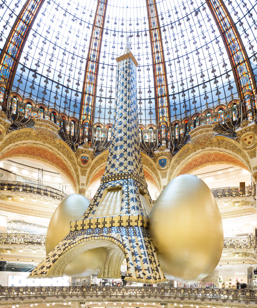 TOILETPAPER with gufram + seletti install inflatable golden eiffel tower at galeries lafayette in paris