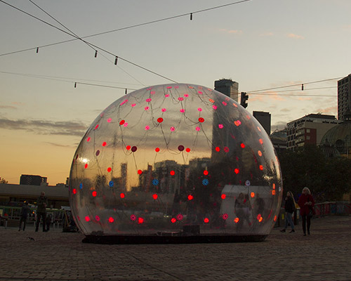 ENESS' sonic light bubble installation in melbourne responds to human interaction