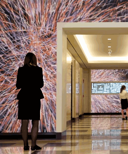 giant motion-activated media reacts to passersby in washington DC office building