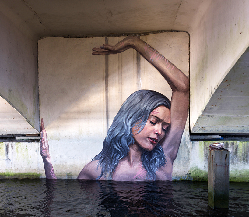 hula-sean-yoro-water-mural-street-art-portrait-designboom-01