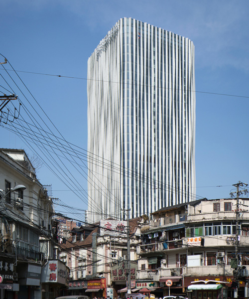 kengo kuma creates a pleated aluminum mesh façade for shanghai office tower