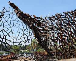 toti semerano constructs an irregular corten steel wall in salento, italy
