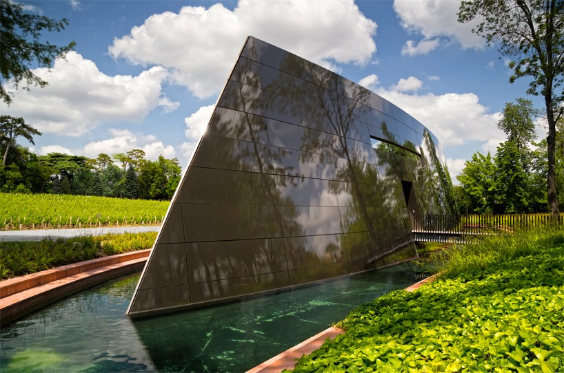 philippe starck's wine cellar for château les carmes haut-brion emerges as a metal blade