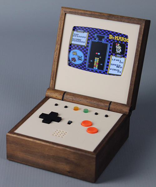 pixel vision is a handmade pocket-sized portable game console rendered in solid walnut by love hultén