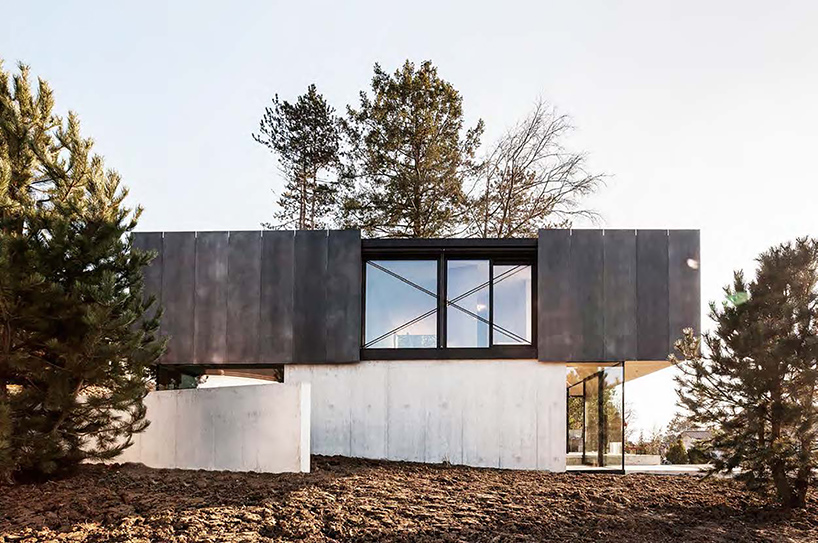 reuter raeber architects develops a house of contrasts with riehen residence