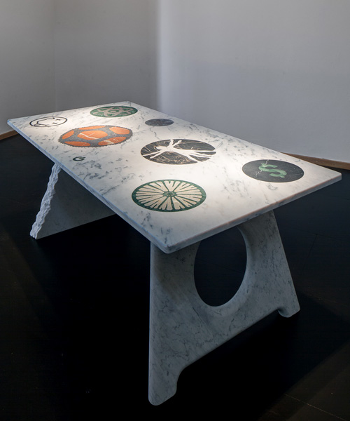 michael young, richard hutten & jerszy seymour lay out marble youhutseymatic table with surrealist inlays