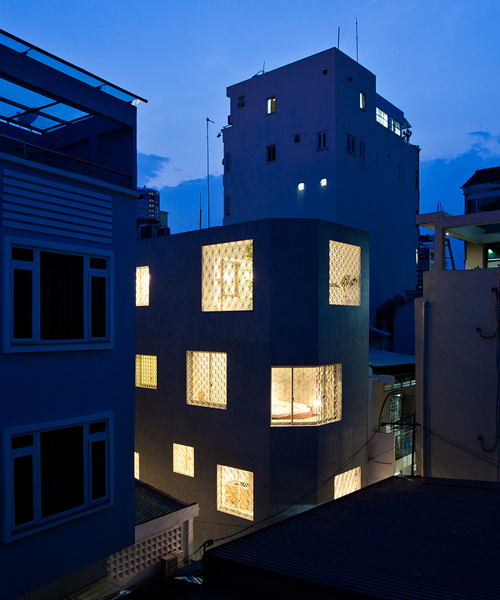 sannuki daisuke architects adds openings to hem house in vietnam