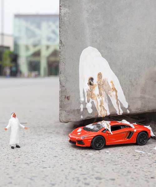 slinkachu sets miniature scenes across dubai's urban landscape